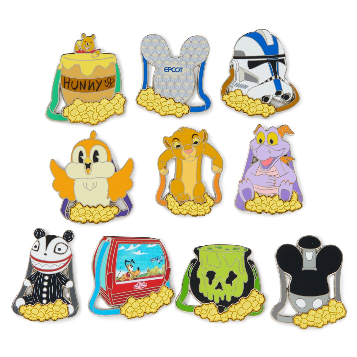 Official product image showing the ten Disney Beyond the Magic popcorn bucket mystery pin designs