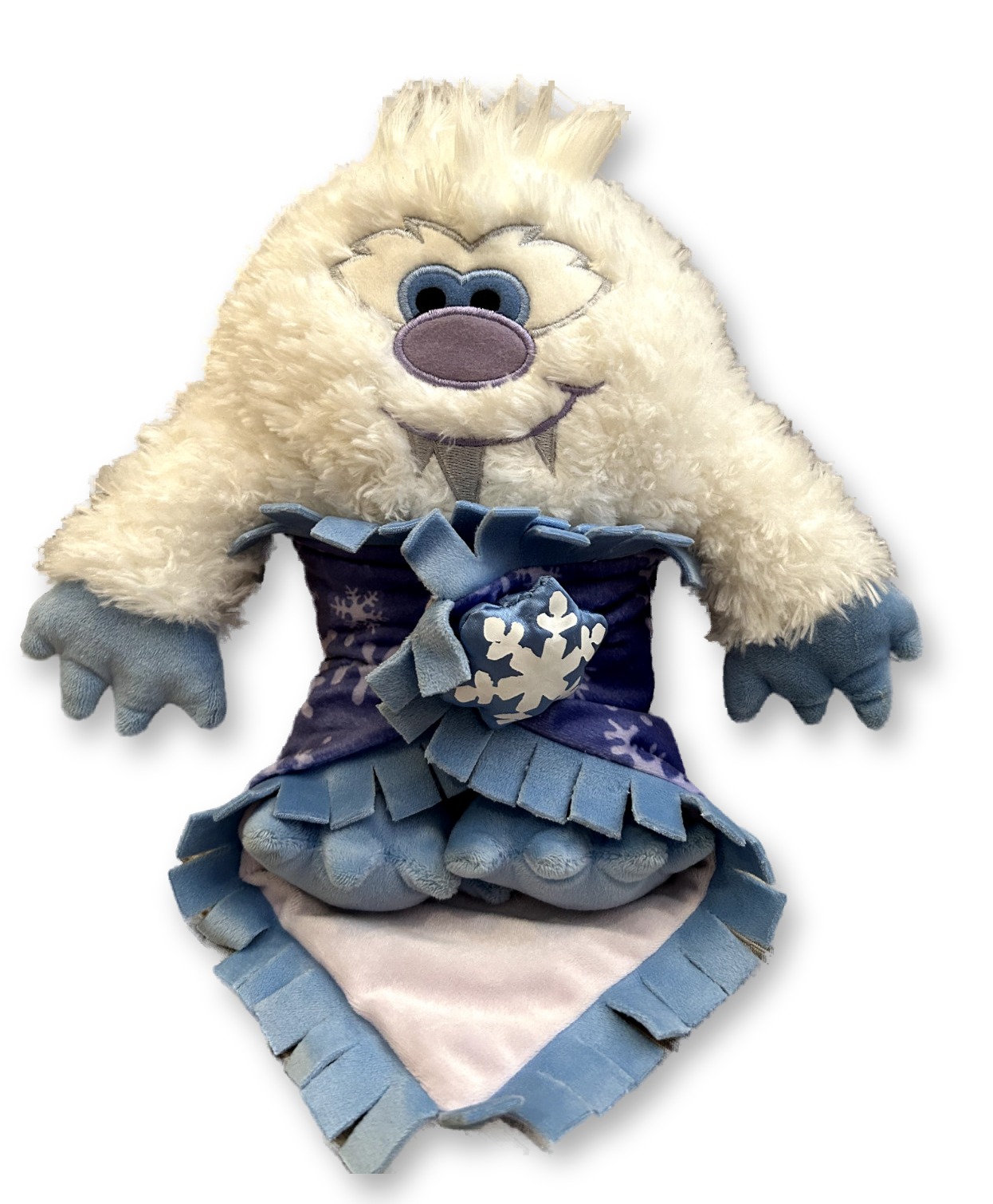 Disney's Babies Yeti plush with blue fur wrapped in a purple snowflake-print blanket with blue fringe trim