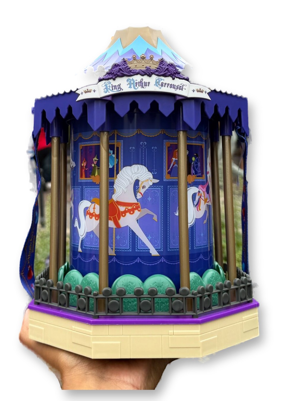 Miniature King Arthur Carrousel-shaped popcorn bucket with spinning horses and a flip-open tent top