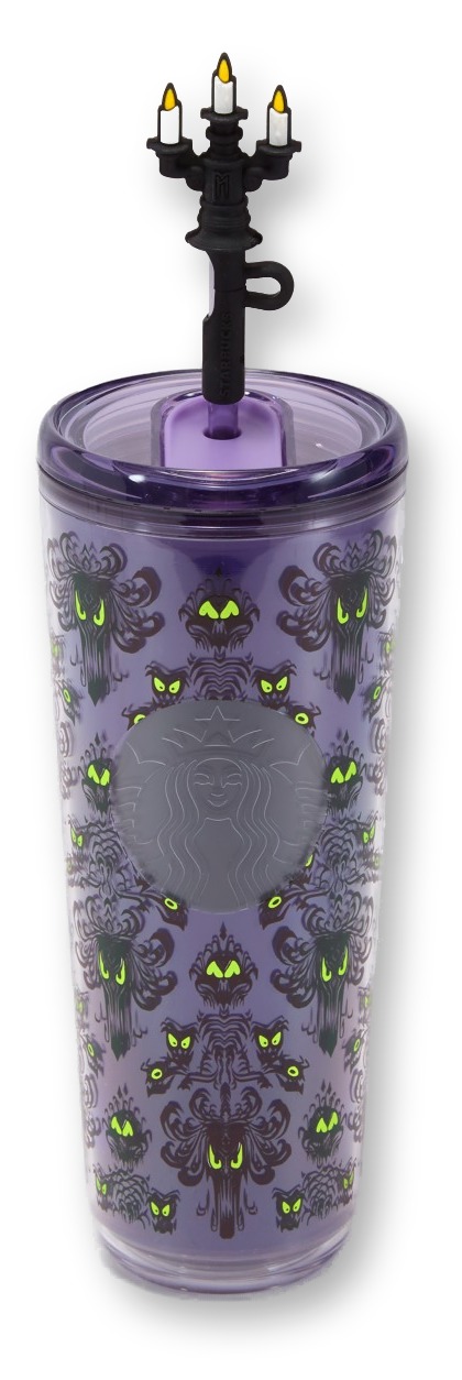 A tall purple acrylic Starbucks tumbler covered in a Haunted Mansion ghost-face wallpaper pattern with glowing green eyes, topped with a black candelabra-shaped straw and lid bearing an embossed Starbucks logo medallion, on a white background.