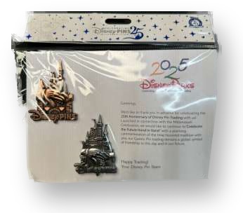 Two silver Disney pin-trading logo pins -- one shaped like Sleeping Beauty Castle, one like Cinderella Castle -- packaged on a '25 Years of Disney Pin Trading' anniversary card.
