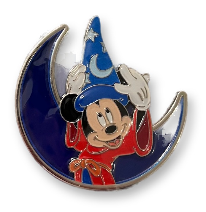Sorcerer Mickey Mouse enamel pin on a crescent moon, packaged on a D23 2024 Limited Edition card with fireworks artwork.