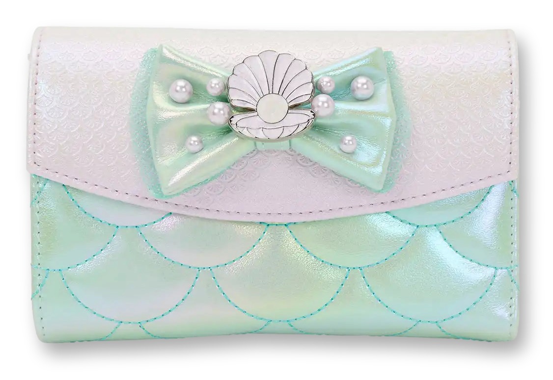 Iridescent green and white Loungefly wallet with a fish-scale texture and a 3D bow featuring a pearl-and-seashell charm, inspired by The Little Mermaid.